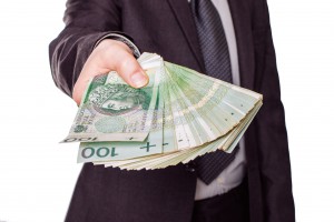 39105567 - polish money - pln - held by businessman